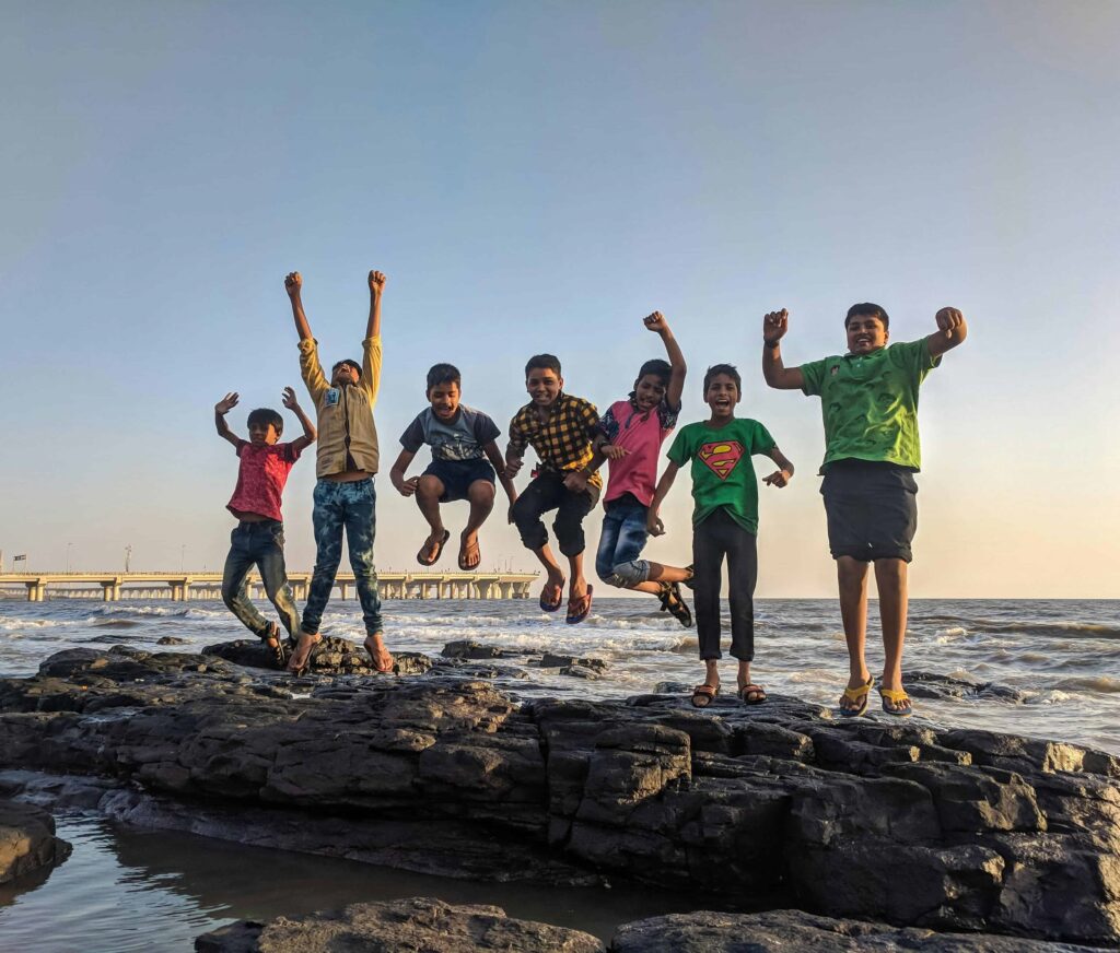 Happy Kids jumping with confidence