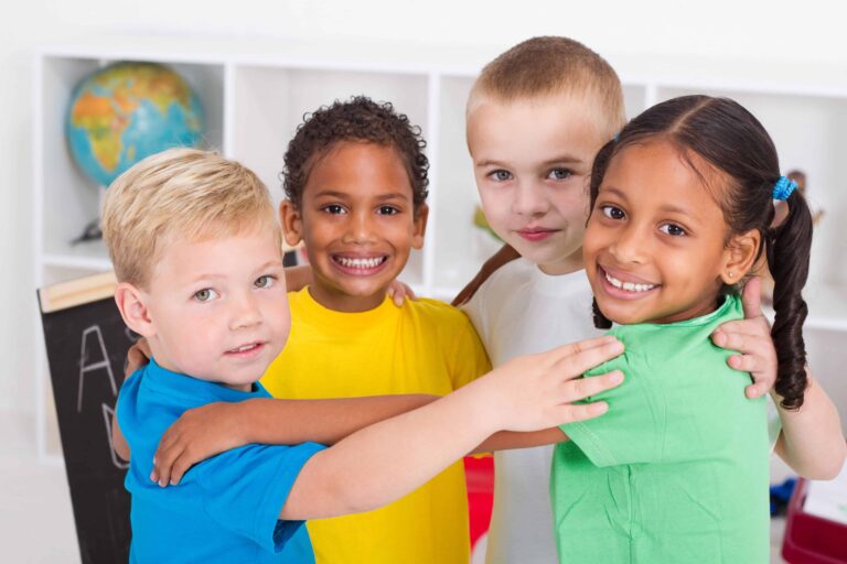 4 kids happy and smiling
